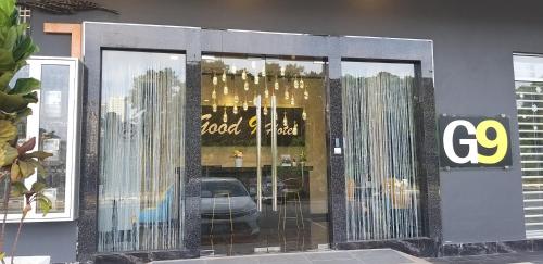 a store front with a sign in front of it at GOOD 9 HOTEL - Cahaya Kota Puteri in Pasir Gudang