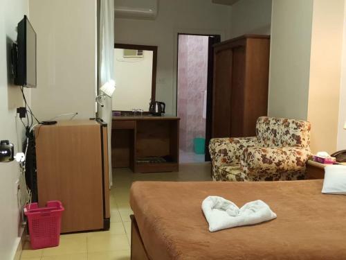 TV a/nebo společenská místnost v ubytování City Center Hotel Beni Suef