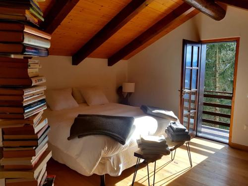 Un pat sau paturi într-o cameră la Chalet “In dai Guriuz”