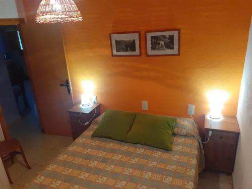 Un pat sau paturi într-o cameră la Cal Calau