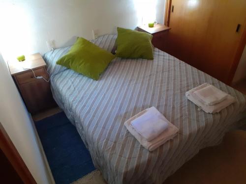 Un pat sau paturi într-o cameră la Cal Calau