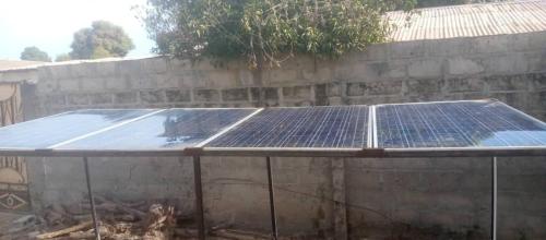 a table with a solar panel on top of a wall at Remarkable 4-Bed with air conditioning in Brikama in Brikama