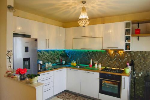 Kuchyňa alebo kuchynka v ubytovaní Apartment Zorka 719