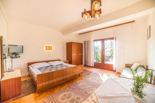 Katil atau katil-katil dalam bilik di Apartments Antić 4255