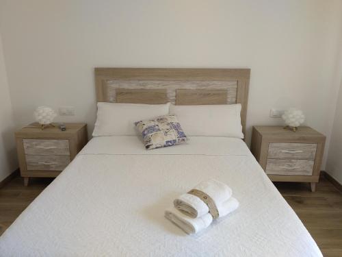 Säng eller sängar i ett rum på Alojamiento Lo Trabucador