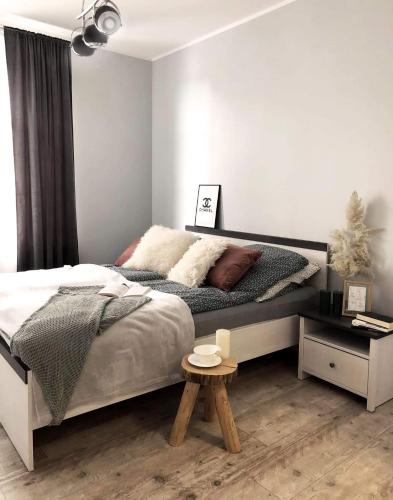 Posteľ alebo postele v izbe v ubytovaní Apartament Stare Miasto