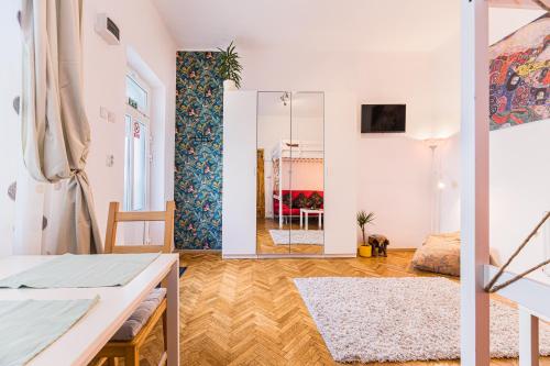 En eller flere senge i et værelse på Zen Studio