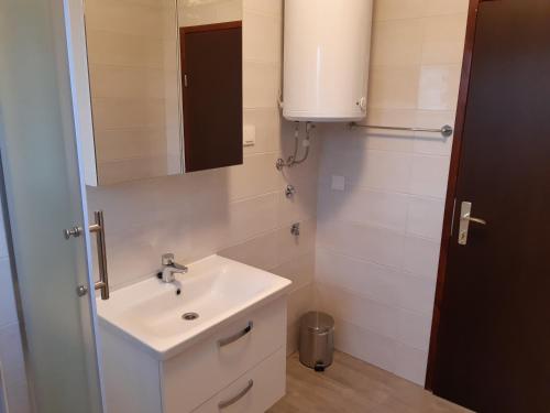Koupelna v ubytování Apartman Helena