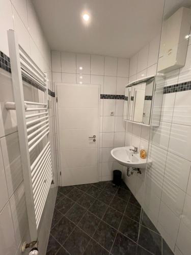 Ένα μπάνιο στο Paradise Apartments