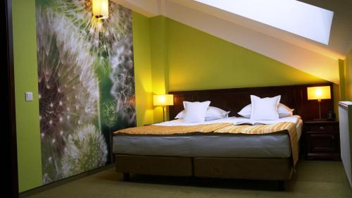 Postel nebo postele na pokoji v ubytování Hotel Residenz