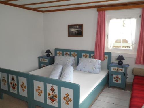 Cama o camas de una habitación en Alpenhaus Waldberg