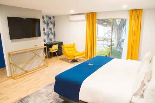 Postel nebo postele na pokoji v ubytování Ramë Hotel Boutique