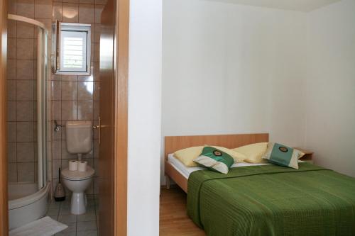En eller flere senger på et rom på Apartments Davor & Marija Sosic