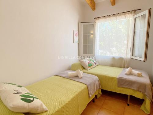 A bed or beds in a room at Villa Vergara