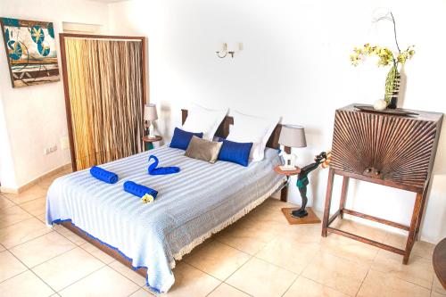 เตียงในห้องที่ Casablanca Fuerteventura Morro Jable Suites