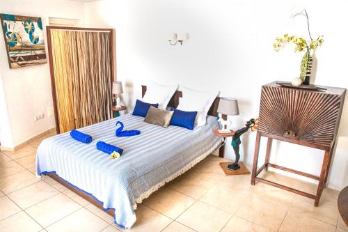 Postel nebo postele na pokoji v ubytování Casablanca Fuerteventura Morro Jable Suites