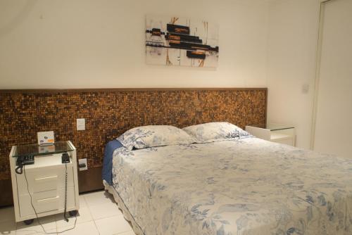 Katil atau katil-katil dalam bilik di Flat Natal - Localização TOP e WIFI