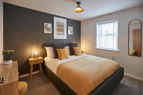 a bedroom with a bed and a window at Host & Stay - Shipwrights in Whitby