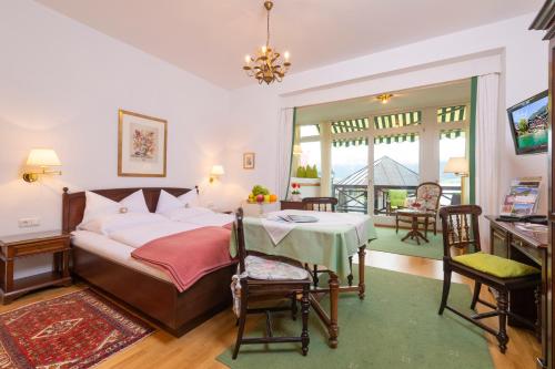 Postel nebo postele na pokoji v ubytování Pension Seehof Appartements