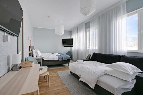 Postel nebo postele na pokoji v ubytování Turinge Hotel