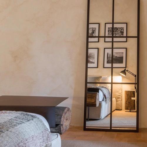 Katil atau katil-katil dalam bilik di Argiano Dimore Wine Relais
