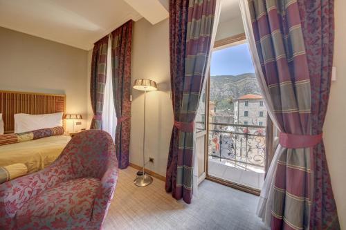 Krevet ili kreveti u jedinici u okviru objekta Hotel Vardar