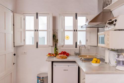 Кухня или мини-кухня в Casas Trafalgar
