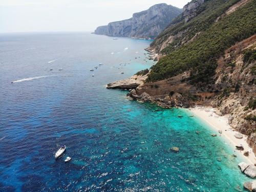 an aerial view of a beach on the amalfi coast at Club Esse Cala Gonone in Cala Gonone