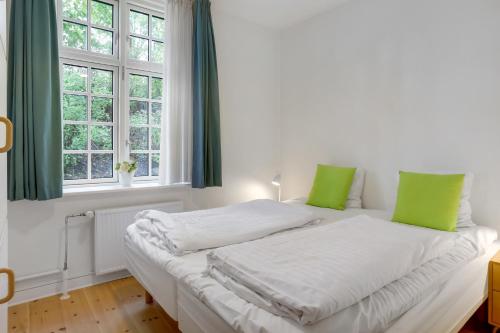 Un pat sau paturi într-o cameră la Viborg Byferie