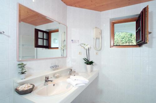 Ванна кімната в Wienerwaldhof Rieger