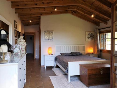 Krevet ili kreveti u jedinici u okviru objekta Chalet con gran jardín en Llivia