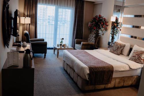 Una cama o camas en una habitación de Reform Hotel