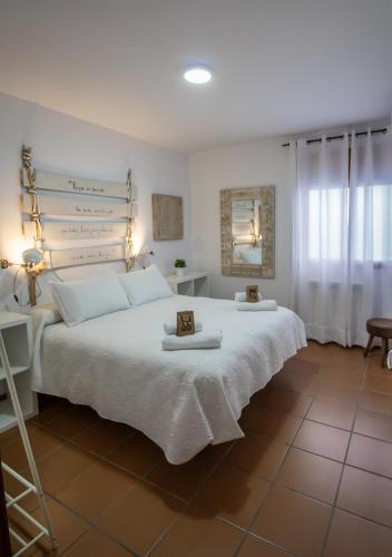Una cama o camas en una habitación de Alojamientos Siente Cazorla