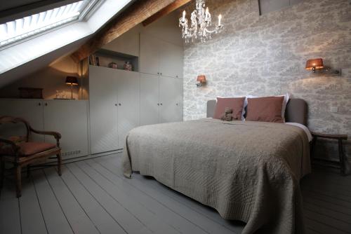 מיטה או מיטות בחדר ב-Guesthouse Alizée