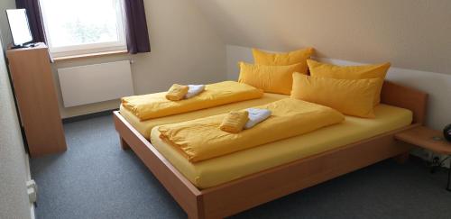 Postel nebo postele na pokoji v ubytování Pension Berghof