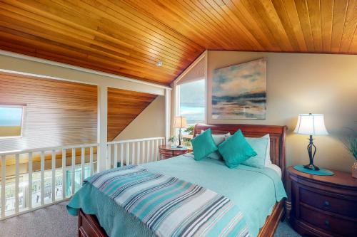 Ένα ή περισσότερα κρεβάτια σε δωμάτιο στο Ocean Light Cottage