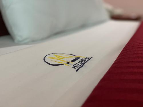 a sticker on the side of a bed at HOTEL MARIA RICO in Mexico City