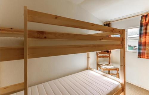 Ένα ή περισσότερα κρεβάτια σε δωμάτιο στο 1 Bedroom Awesome Home In Haffkrug