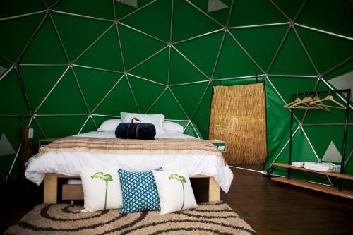 Postel nebo postele na pokoji v ubytování Samaná Ecohabs Glamping