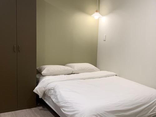 Postel nebo postele na pokoji v ubytování Upflo Hostel
