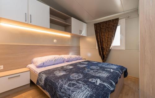 Posteľ alebo postele v izbe v ubytovaní Mobile home Rock Rose 1