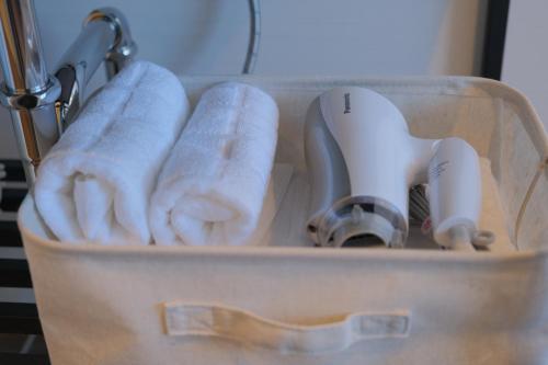 a container with two hair dryers and two hair drivers at Megu Fuji 2021 in Fujiyoshida