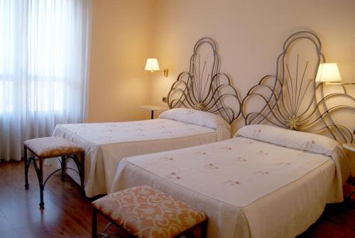 Ένα ή περισσότερα κρεβάτια σε δωμάτιο στο Manrique de Lara
