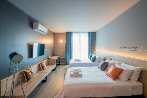 Ένα ή περισσότερα κρεβάτια σε δωμάτιο στο TK Bed