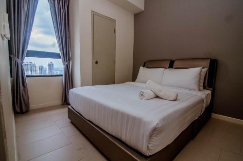 Katil atau katil-katil dalam bilik di Tamarind Square Cyberjaya By IdealHub