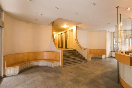 a staircase in a building with a stair case at Fleming 58 by Hili in Rome