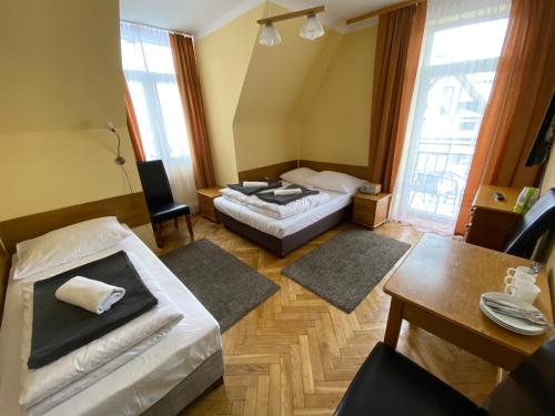Postel nebo postele na pokoji v ubytování Rusałka