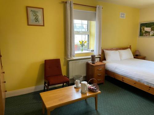 Postel nebo postele na pokoji v ubytování An Stór Townhouse