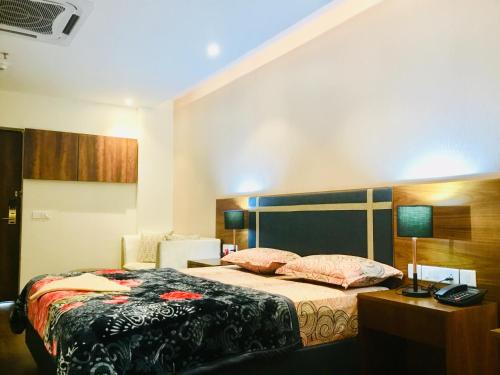 Ένα ή περισσότερα κρεβάτια σε δωμάτιο στο Dreamial Element One Studio @ Sector 47 Gurgaon