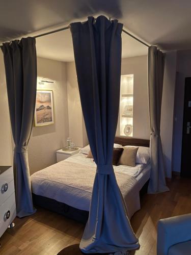 Кровать или кровати в номере Apartament Glamour II
